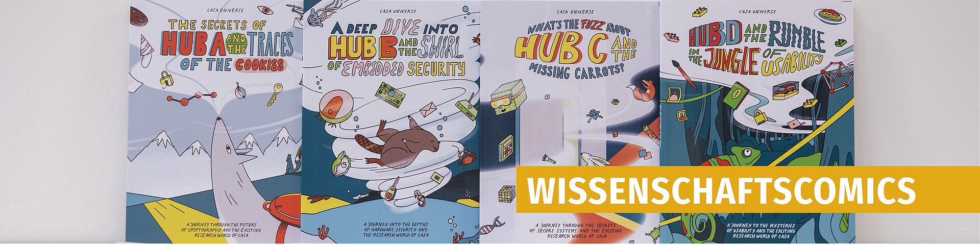 Vier bunte Comic-Cover mit wissenschaftlichen Themen nebeneinander, darunter Berge, ein U-Boot, ein Weltraumhintergrund und ein Dschungel.